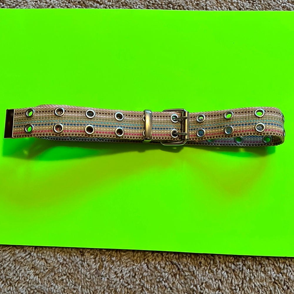 Ladies belt khaki color with color stripes. Size is small.